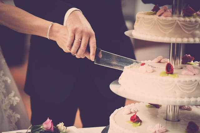 The Tradition Of Cutting The Wedding Cake